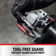Photo of Craftsman angle grinder CMCG451B with tool-free guard adjustment feature, close-up in use.