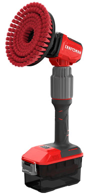 Cordless power scrubber tool with a red and black design, featuring a circular red bristle brush attachment and a detachable battery at the base. The tool is branded 'CRAFTSMAN' and is shown against a white background.