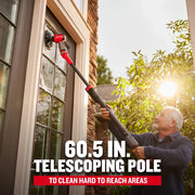Photo of CRAFTSMAN CMCPS520D1 60.5 in. telescoping pole scrub brush cleaning an exterior window.