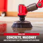 Photo of Craftsman power scrubber CMCPSHB cleaning wet concrete floor, heavy-duty brush head attached.