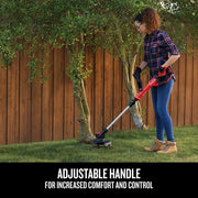 Photo of Craftsman cordless string trimmer CMCST900B in use on grass near a wooden fence, product held by user.