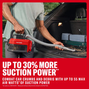 Man uses a CRAFTSMAN cordless handheld vacuum to clean car trunk with debris. Text highlights suction power boost.