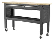 A rolling workbench with a wooden top, two metal drawers, perforated side panels, a lower metal shelf, and four locking caster wheels. The brand logo 'Craftsman' is visible on the front.