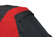 Photo of Craftsman outdoor equipment cover, SKU CMXGZAA52002101, showing black and red fabric with vent detail, angled view.