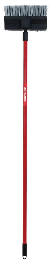 Craftsman floor broom CMXMLBA7210A with red handle and wide black and gray brush, front view on white background.