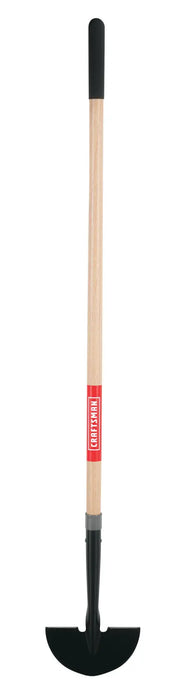 A garden edger tool with a wooden handle, a black rubber grip at the top, and a black metal half-moon blade at the bottom. The handle features a red and white label.